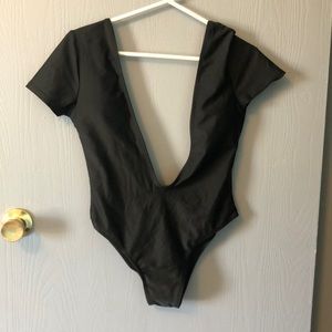 Plunge neckline and low back one piece swimsuit